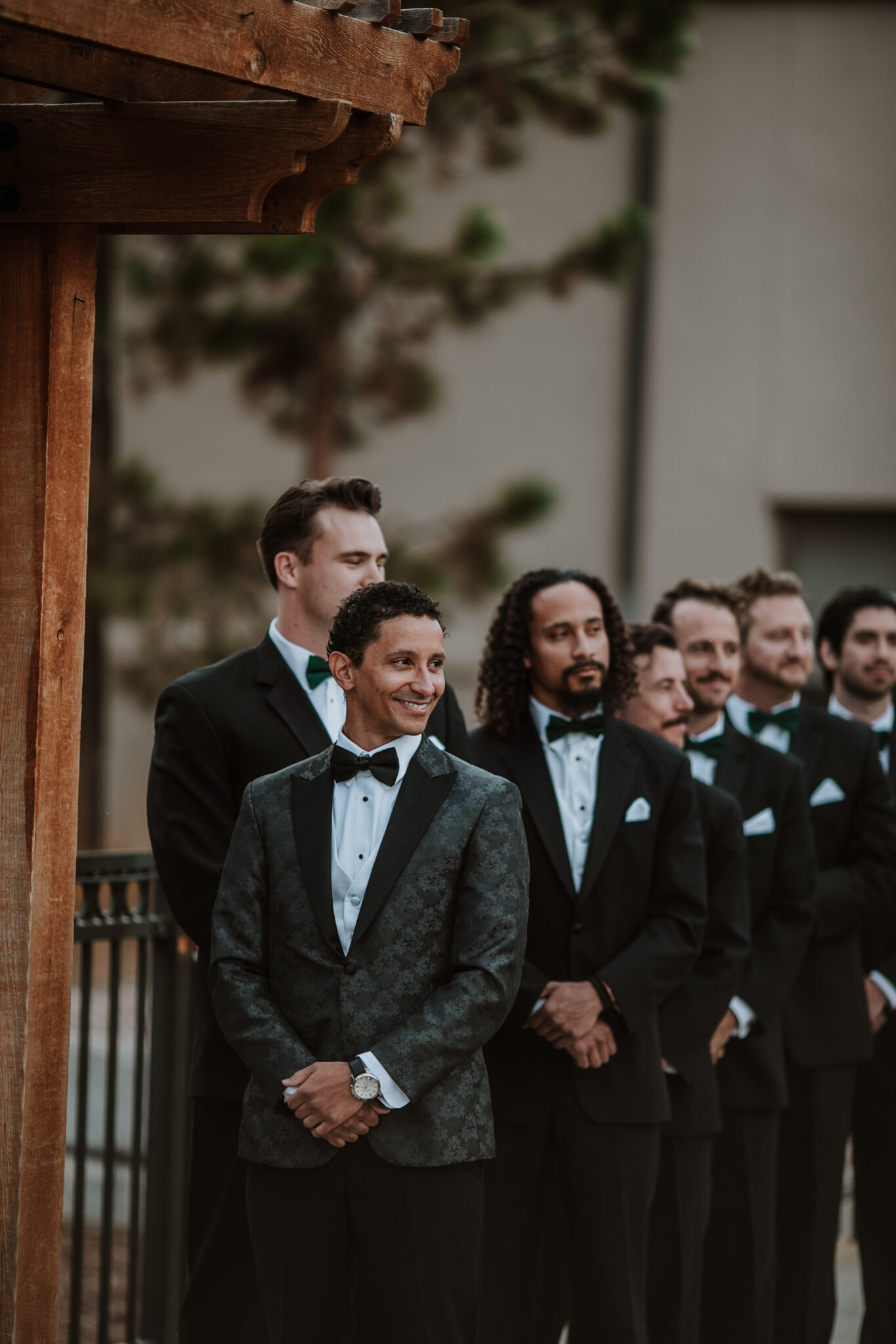 Grooms first time seeing bride walking down asile at Wedgewood Weddings Black Forest in Colorado Springs