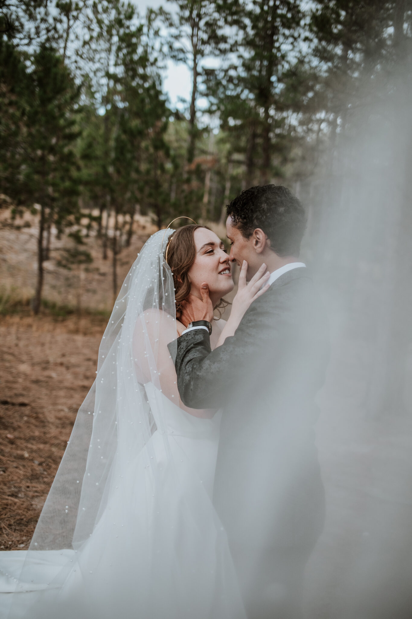 Romantic golden hour portraits of the newlyweds in the pine forest at Wedgewood Weddings Black Forest