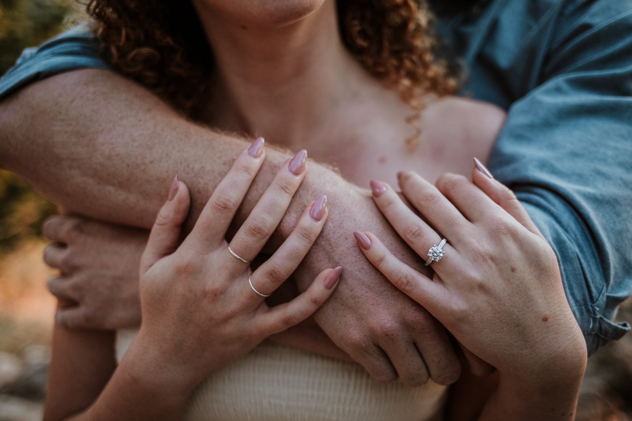 Boulder engagement photographer capturing golden sunrise