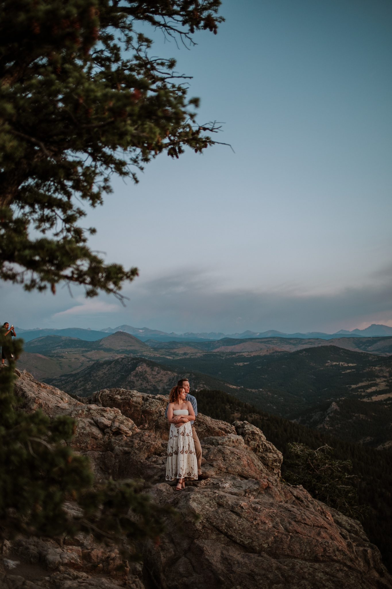 Boulder engagement photographer capturing golden sunrise