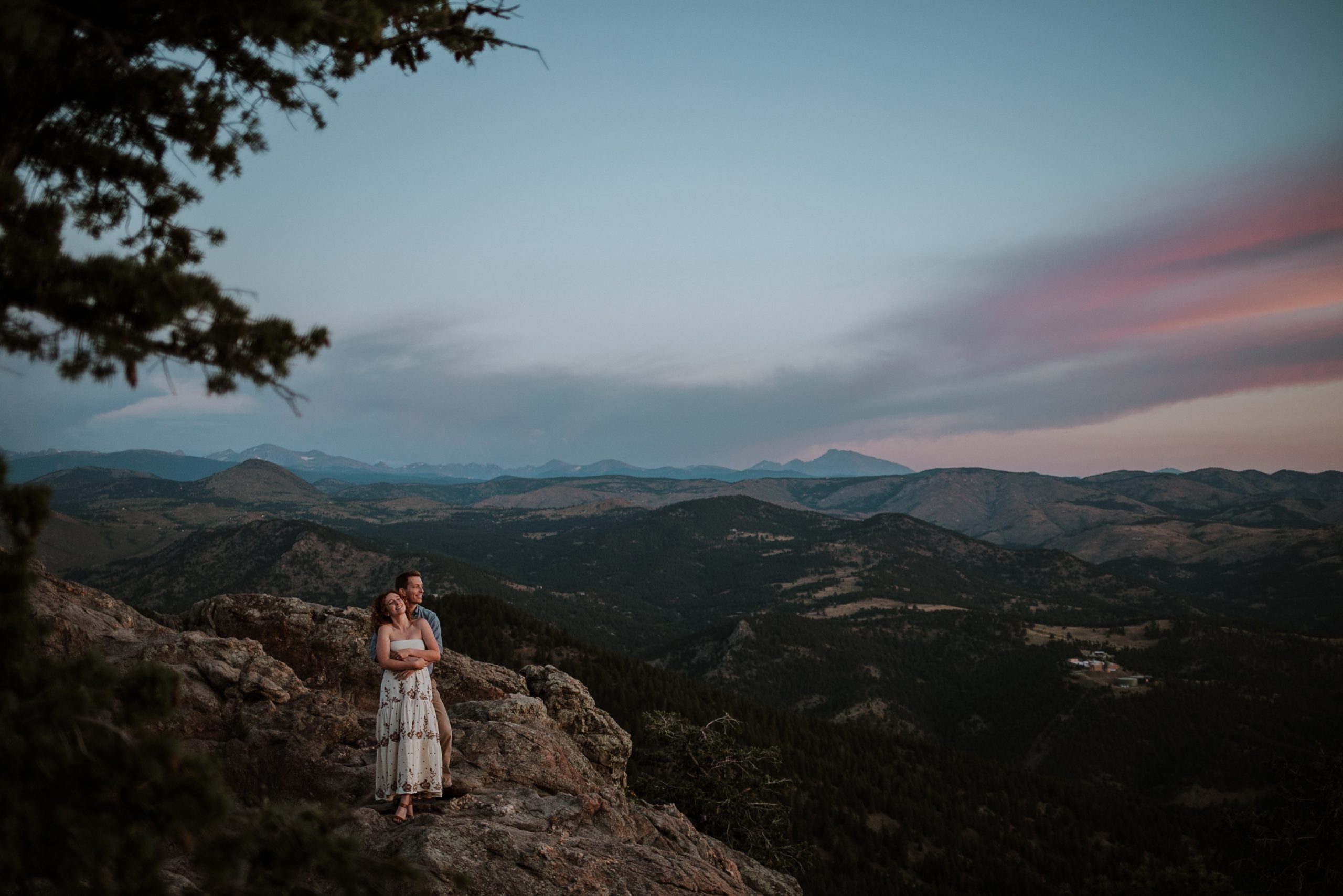 Boulder engagement photographer capturing golden sunrise