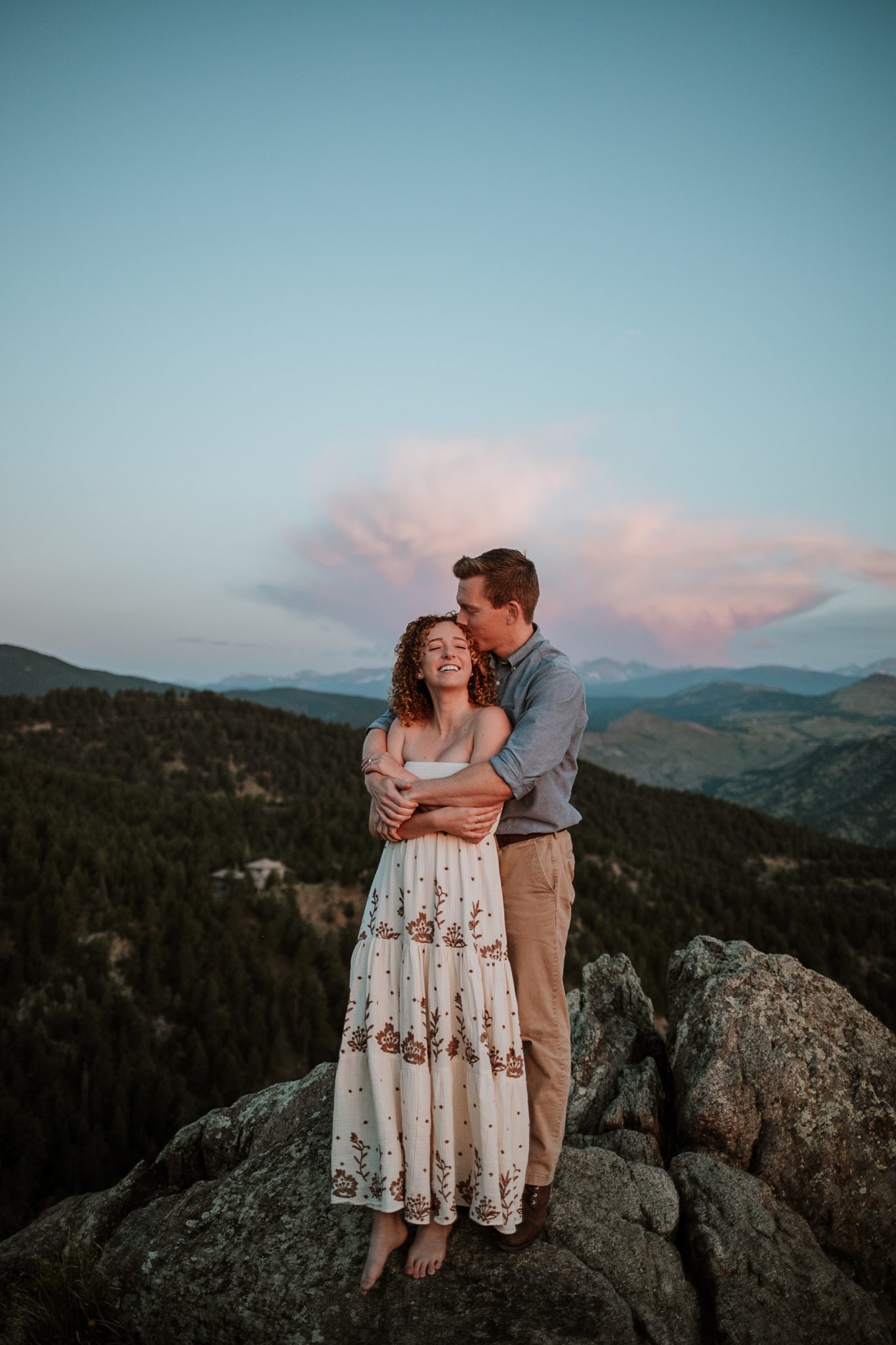 Boulder engagement photographer capturing golden sunrise