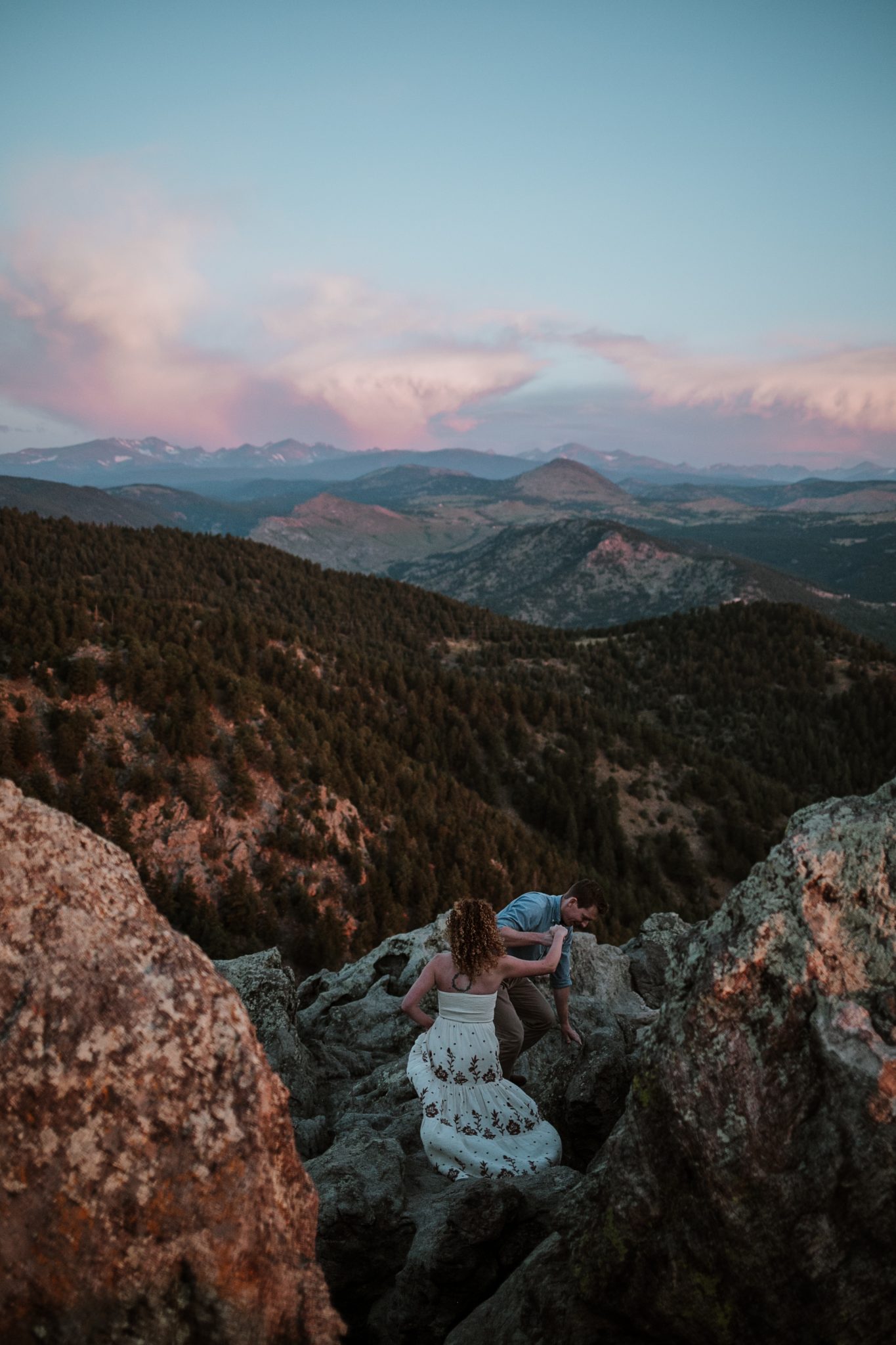 Boulder engagement photographer capturing golden sunrise
