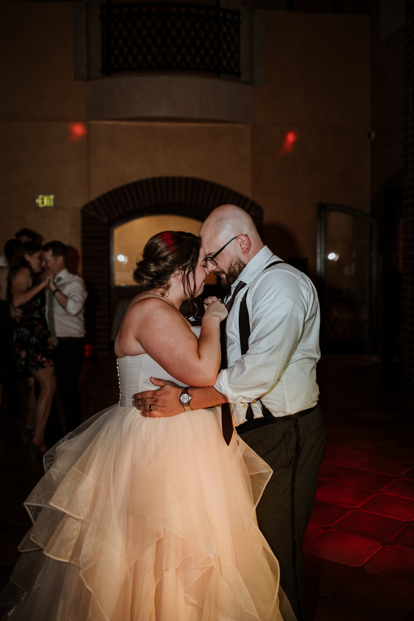 newlyweds celebrating at end of fall wedding day Denver Colorado